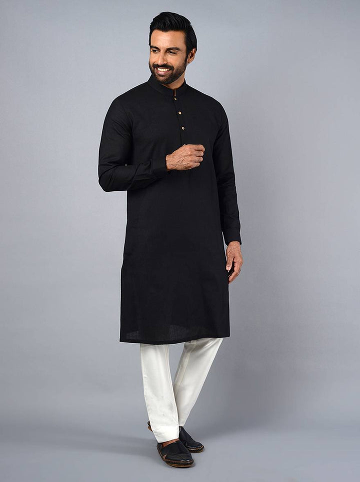 Comfortable black kurta set crafted from Poly Khadi, perfect for various gatherings in the USA.