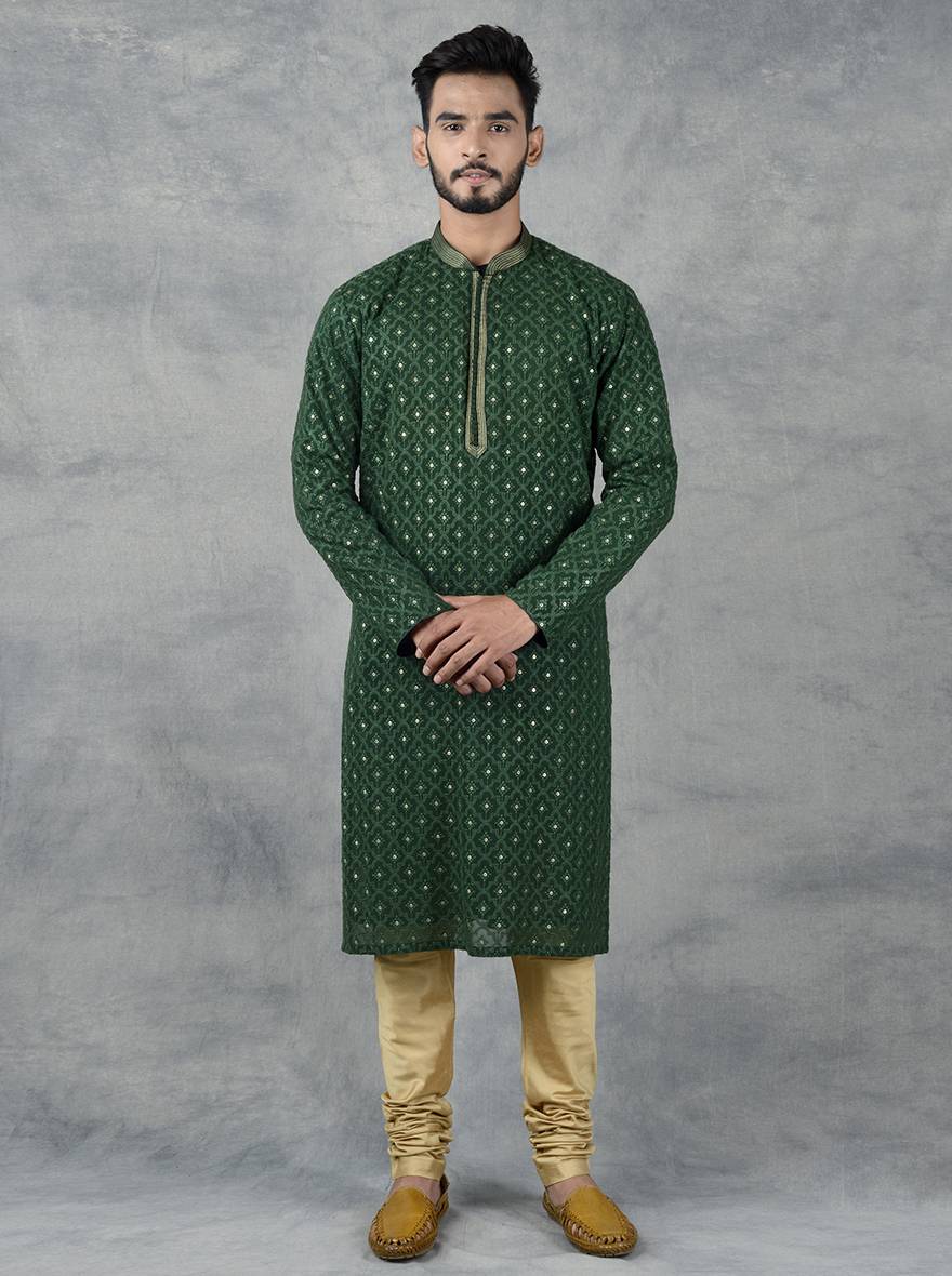 USA men’s green kurta with golden churidar, traditional wedding wear.