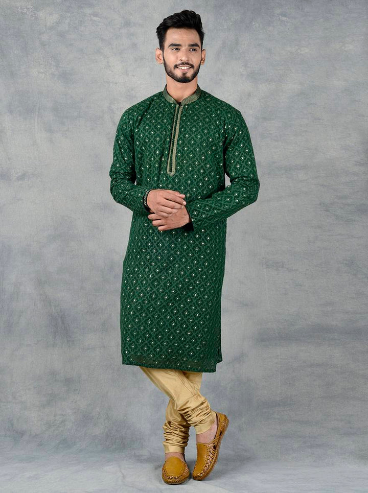 Green men’s kurta set with gold churidar, perfect for USA ceremonies.