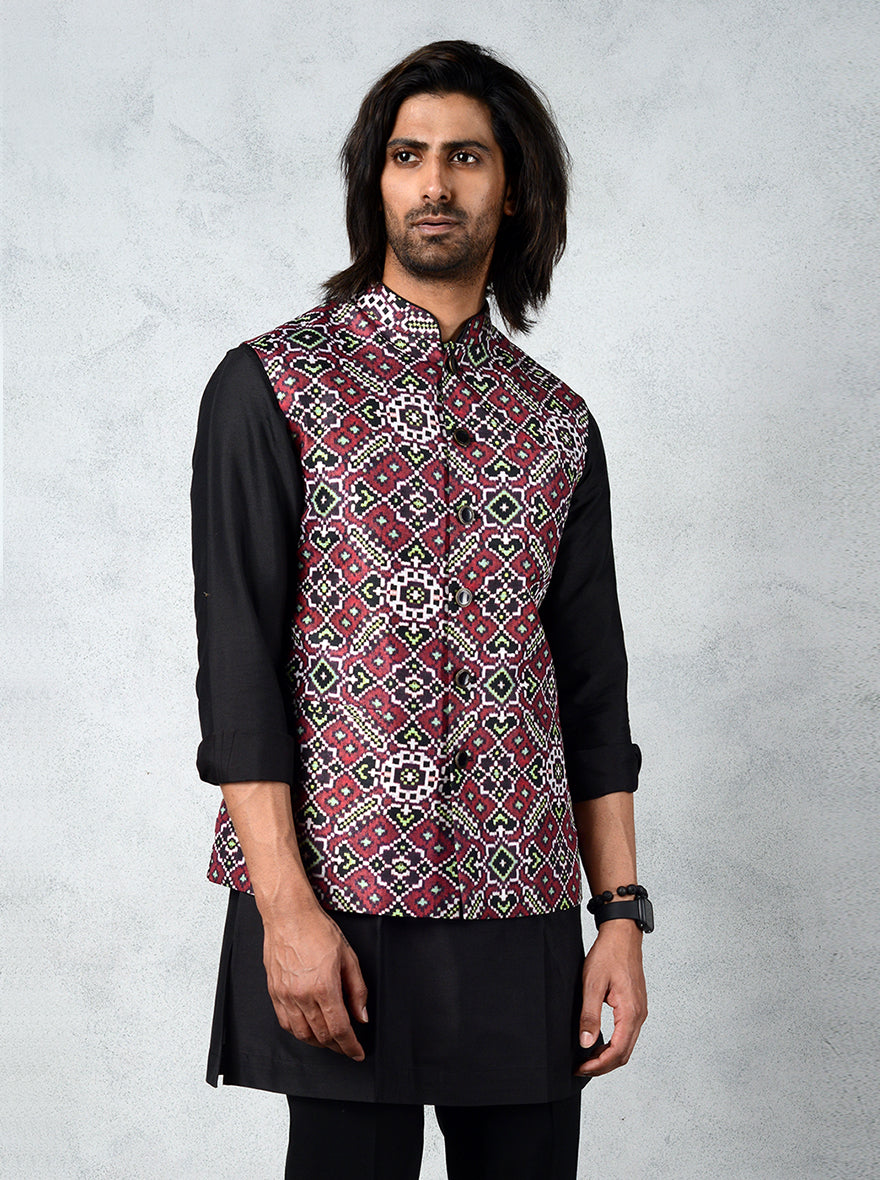 Stylish Patola Print Bandhgala jacket featuring exquisite craftsmanship and rich wine hue for a fashionable look.