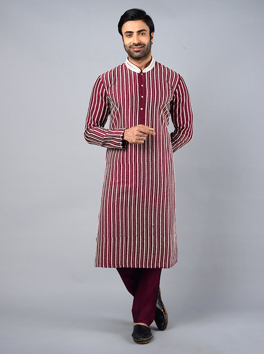 Featuring premium Silk Blend fabric and exquisite embroidery, this kurta set exudes elegance.