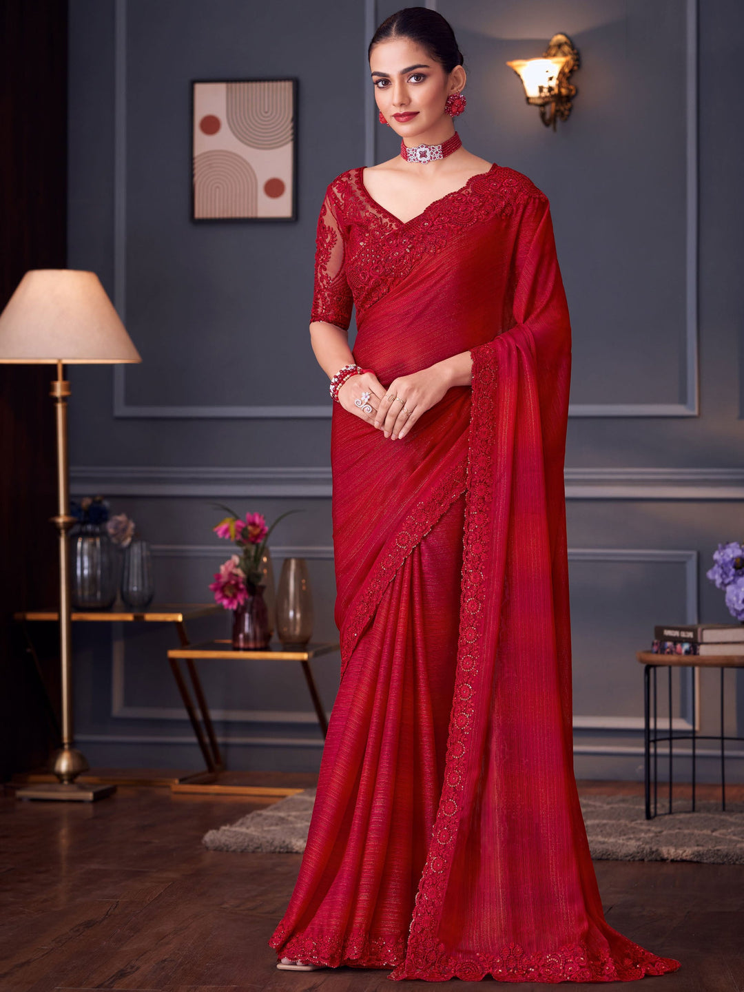 Red silk saree crafted for elegance and style.