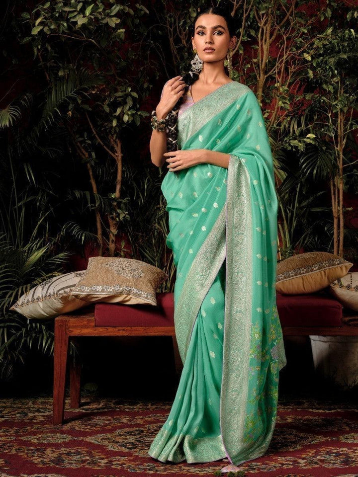 Green silk saree crafted for elegance and style.