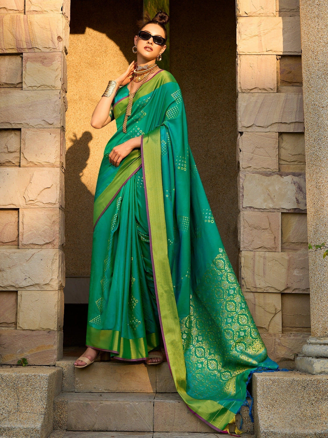 Green silk saree crafted for elegance and style.