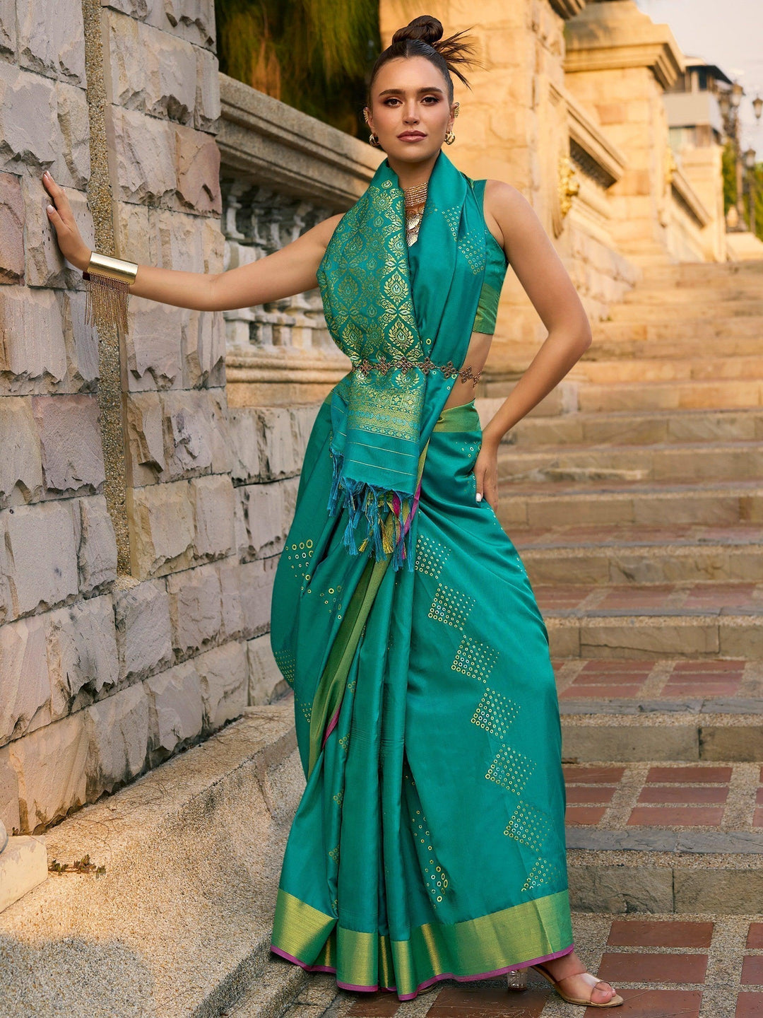 Green silk saree crafted for elegance and style.