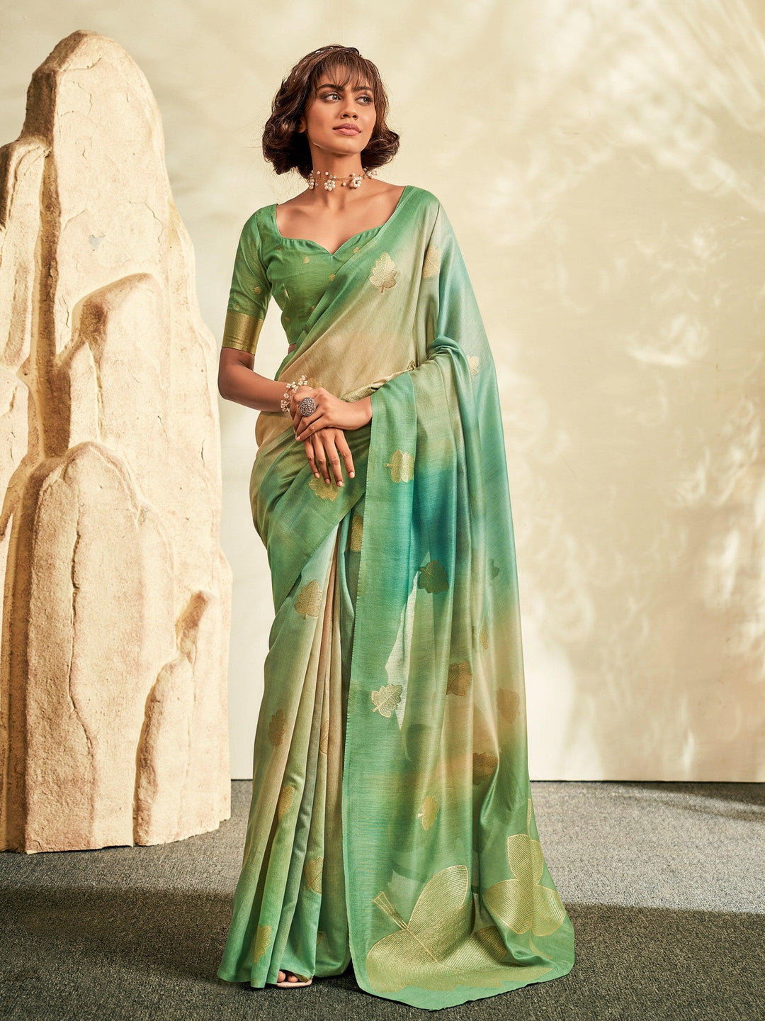 Green silk saree crafted for elegance and style.