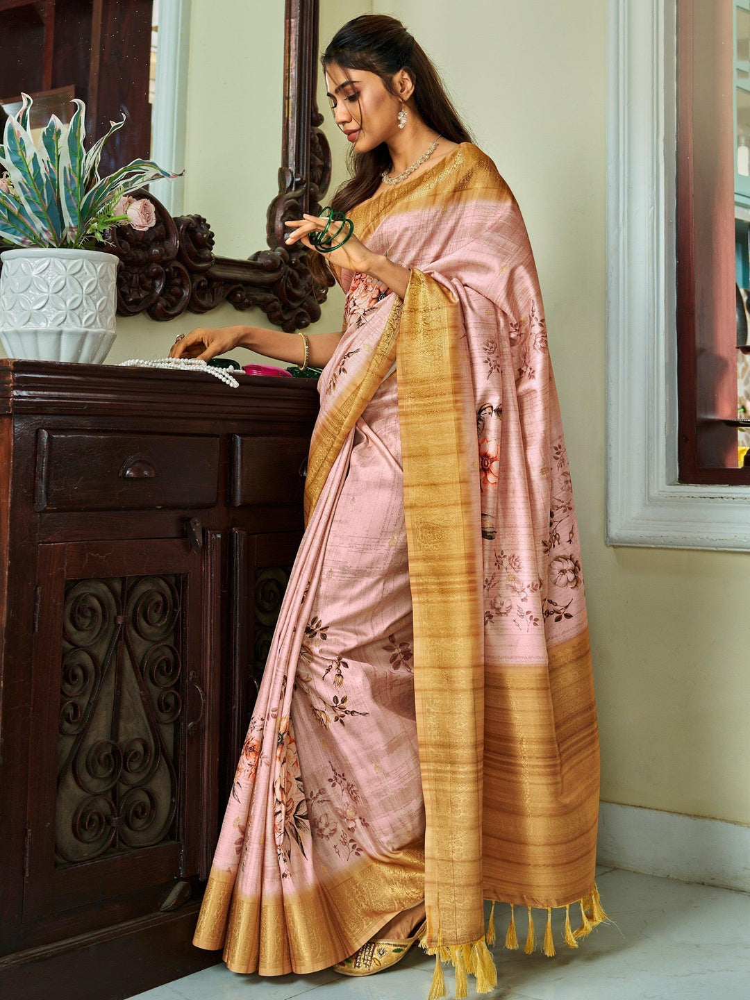 Pink silk saree crafted for elegance and style.