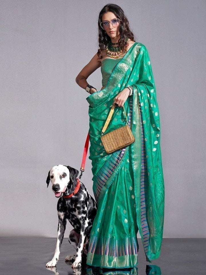 Green silk saree crafted for elegance and style.