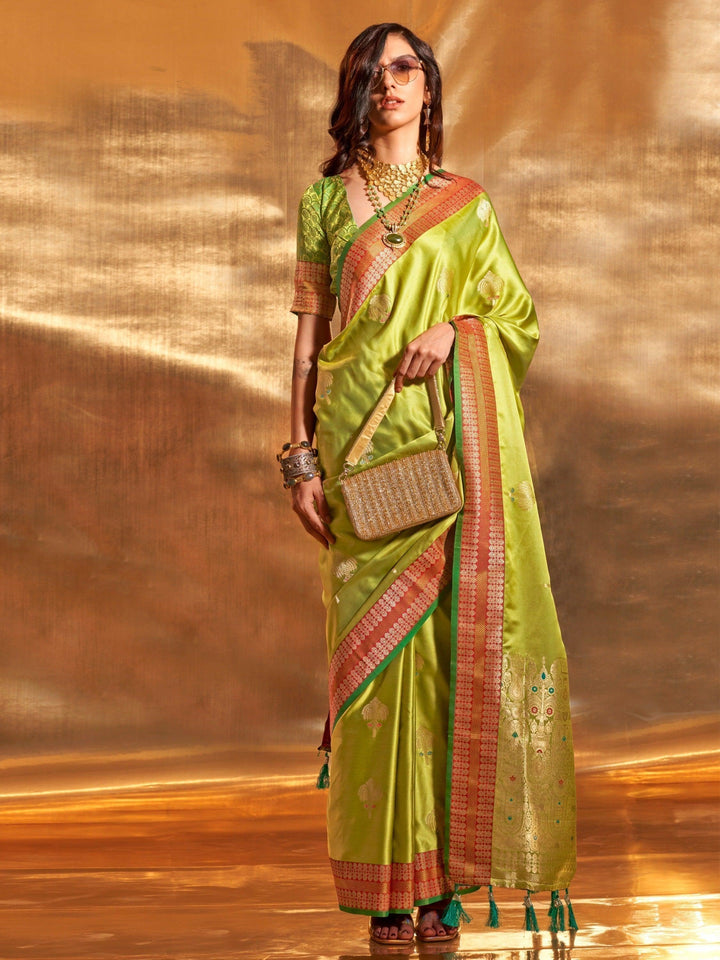 Green satin saree crafted for elegance and style.