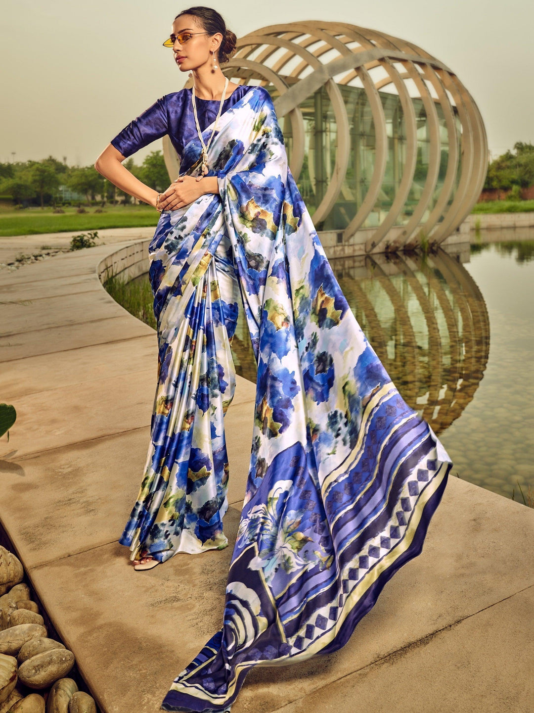 Blue satin saree crafted for elegance and style.