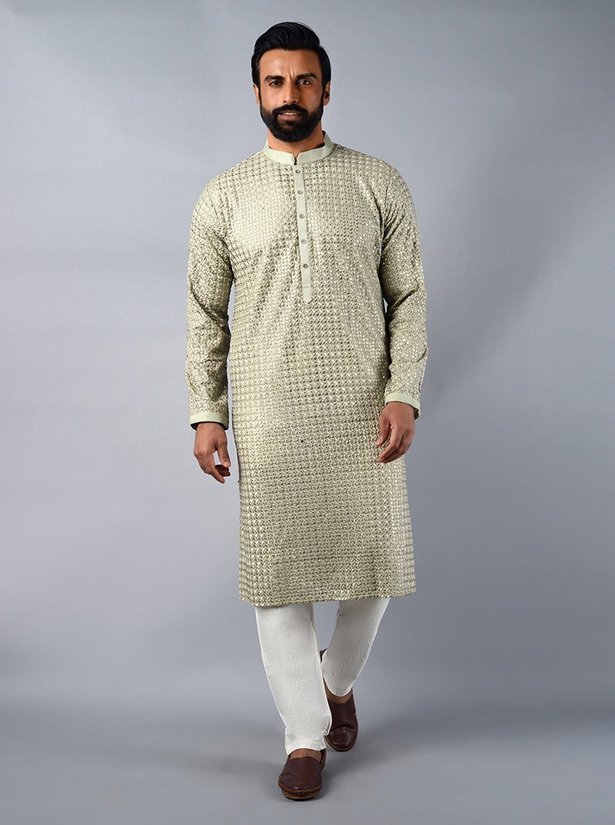 Unique pista green kurta set showcasing badla embroidery, perfect for traditional events in the USA.