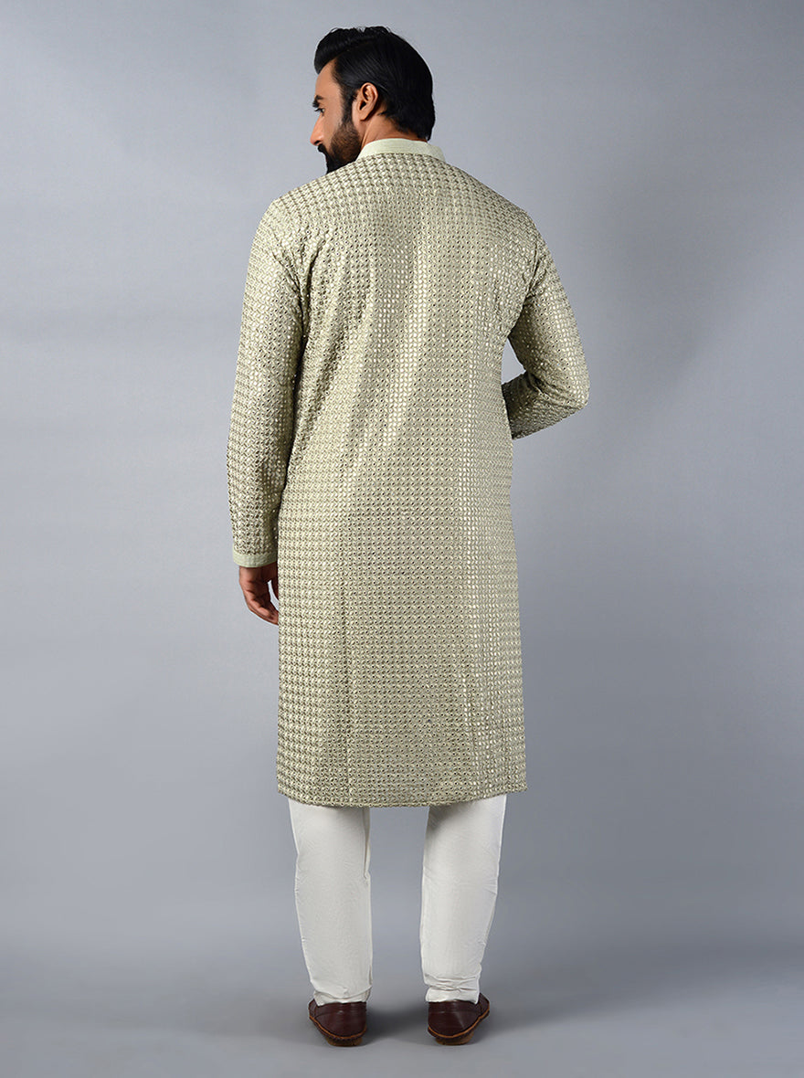 Comfortable pista green kurta set in silk blend fabric, ideal for festivals and celebrations in the USA.