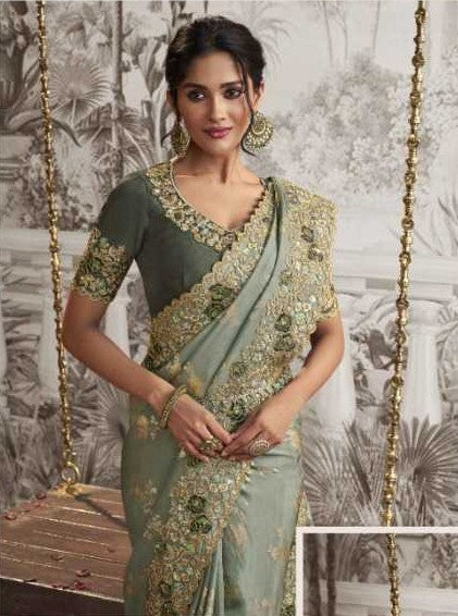 Pista Green Dola Silk Saree | Elegant Zari Embroidery with Delicate Latkan