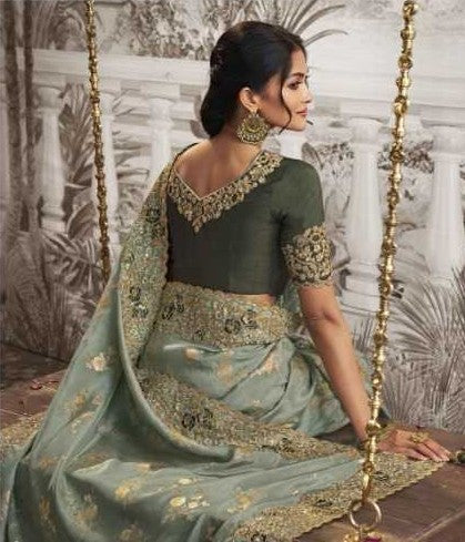 Pista Green Dola Silk Saree | Elegant Zari Embroidery with Delicate Latkan