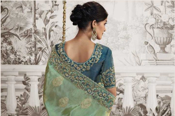 Sky Blue Dola Silk Saree | Graceful Zari Embroidery and Chic Latkan