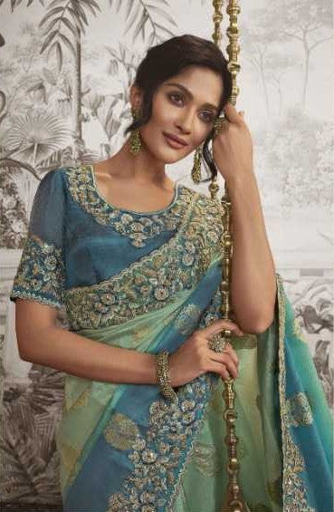 Sky Blue Dola Silk Saree | Graceful Zari Embroidery and Chic Latkan