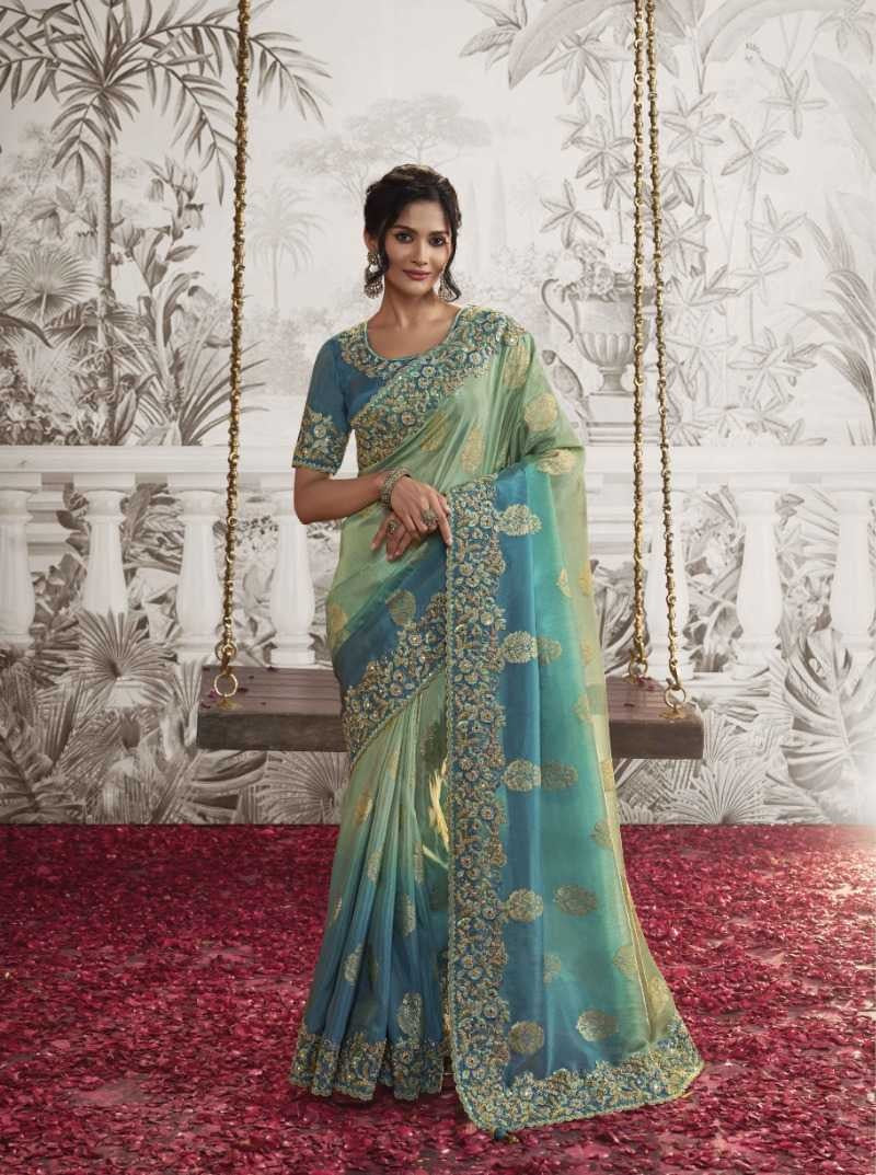 Sky Blue Dola Silk Saree | Graceful Zari Embroidery and Chic Latkan