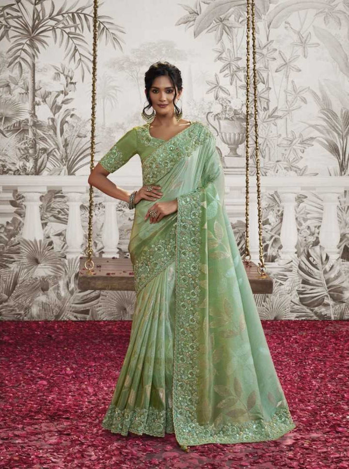 Sea Green Dola Silk Saree | Gorgeous Zari Embroidery with Unique Latkan