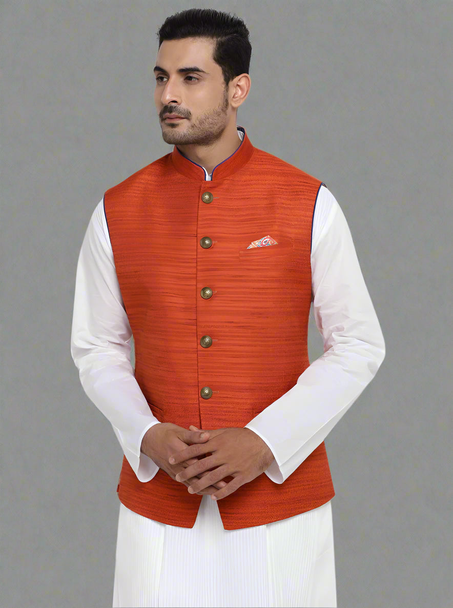 Elegant rust silk blend waistcoat featuring a self-textured design, ideal for adding style to your outfit.