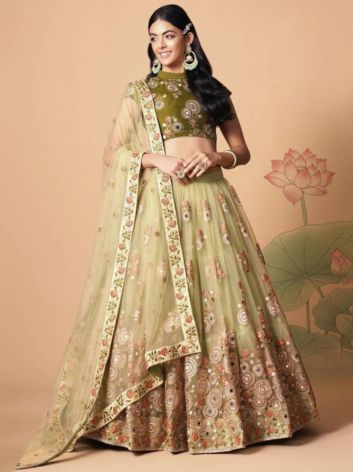 Pastel green mirror work lehenga choli for weddings and parties.