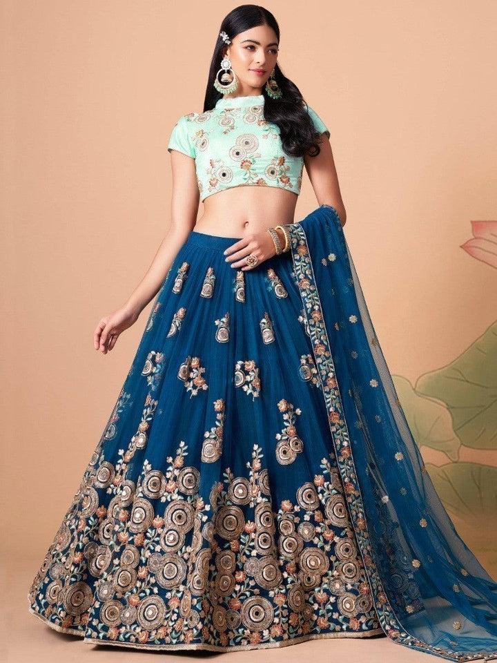 Traditional party wear dove blue lehenga with matching dupatta.