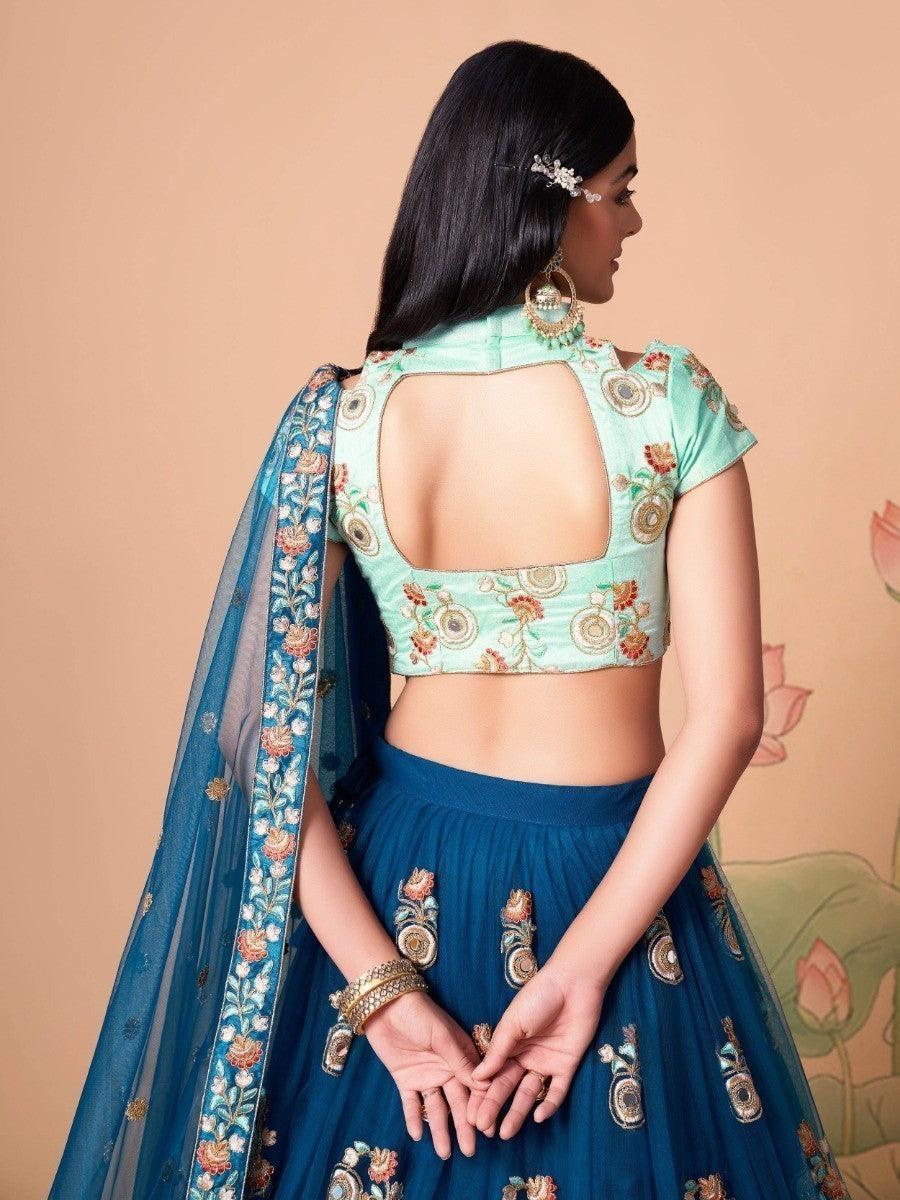 Stunning dove blue lehenga with detailed thread and sequin work.