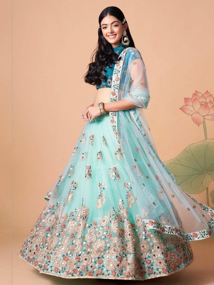 Traditional sky blue lehenga choli with matching dupatta.