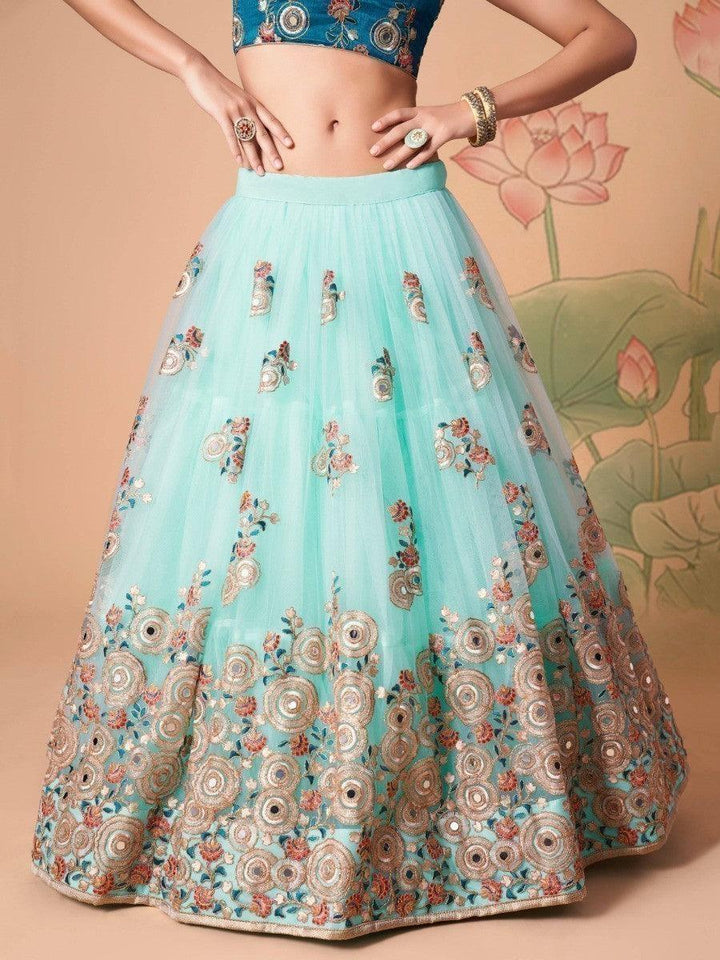 Sky blue party wear lehenga with detailed embroidery and sequins.