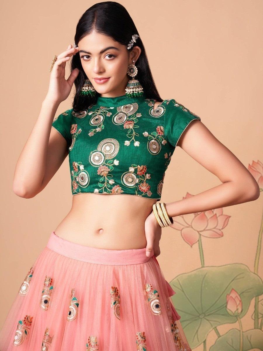 Semi-stitched peach lehenga with thread and mirror embroidery.