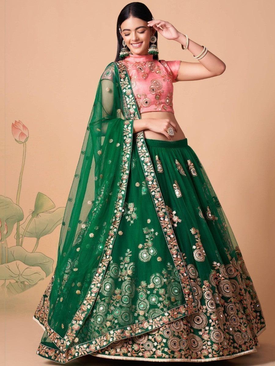 Elegant green lehenga with pink art silk choli and dupatta.