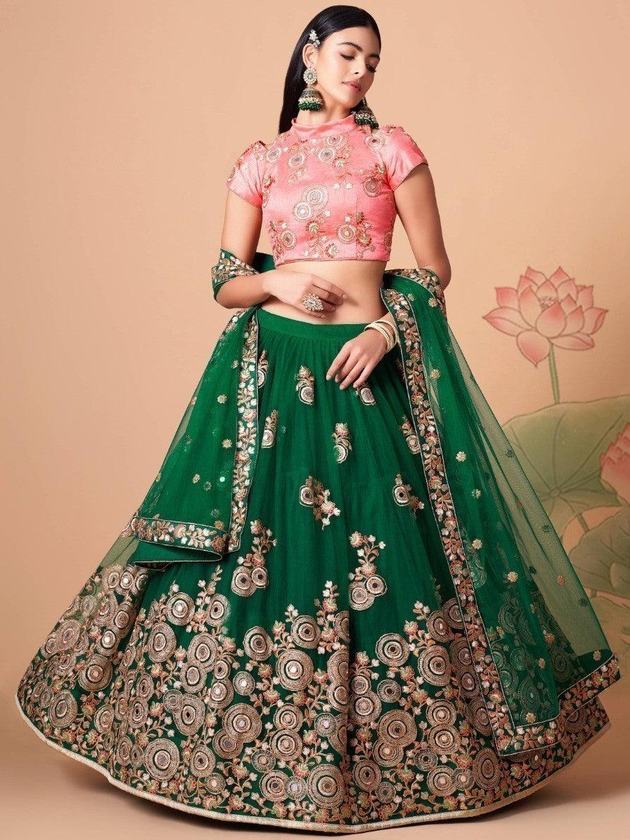 Traditional green lehenga with sequin and thread embroidery.