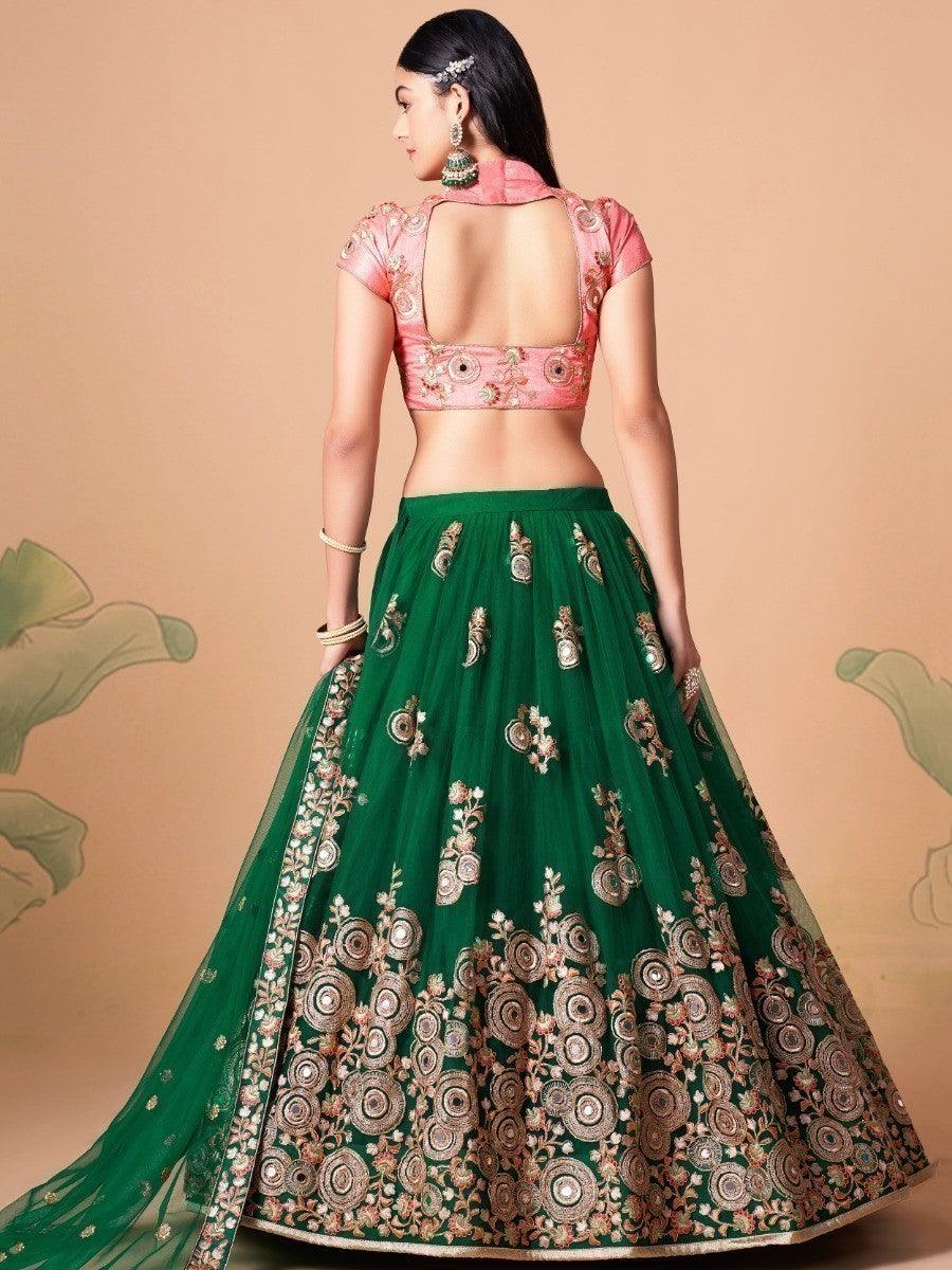 Green lehenga with sequin and mirror work for wedding occasions.