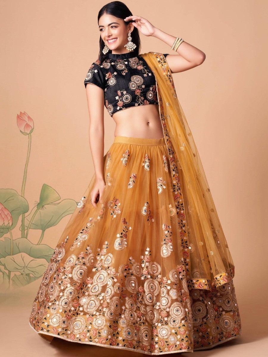 Bridal gold lehenga with intricate embroidery and sequin work.