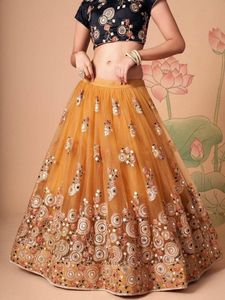 Golden design lehenga choli perfect for weddings and celebrations.