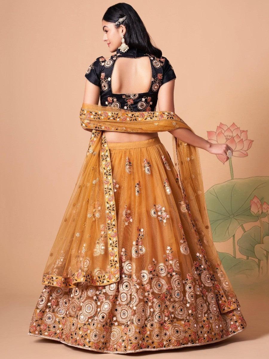 Gold net lehenga with matching dupatta for weddings and events.