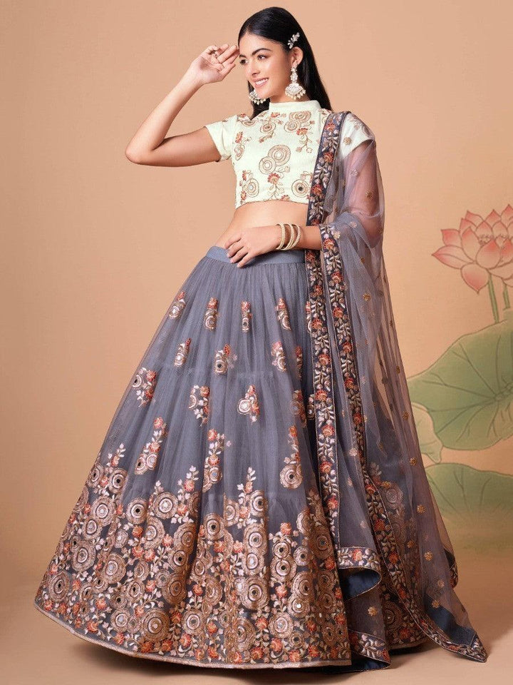 Bridal grey lehenga choli with thread embroidery and intricate design.