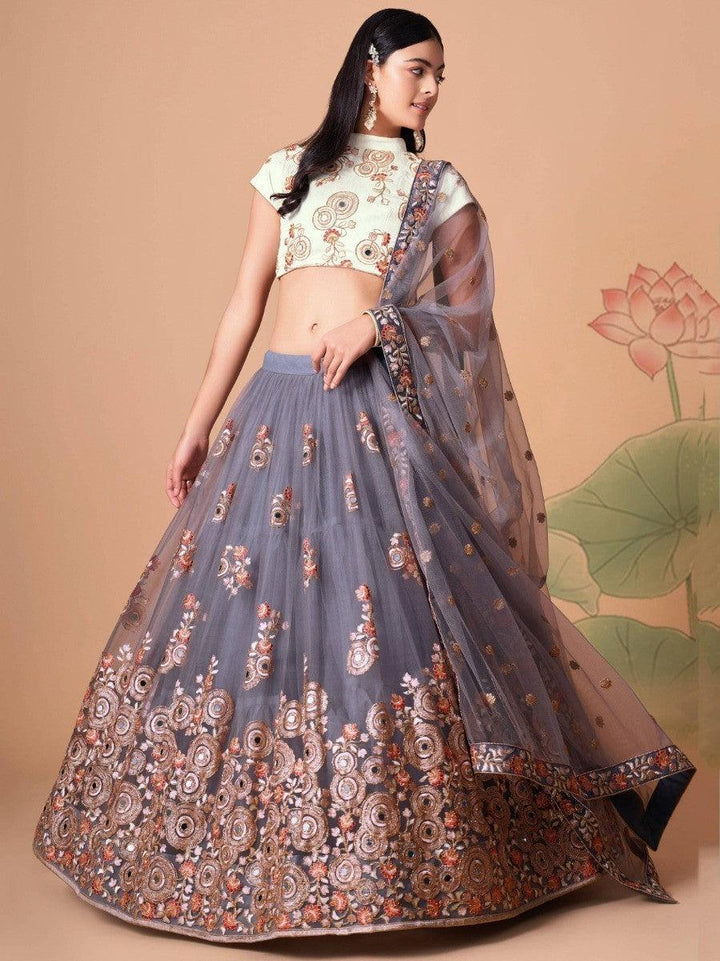 Traditional grey lehenga with matching ivory art silk choli.