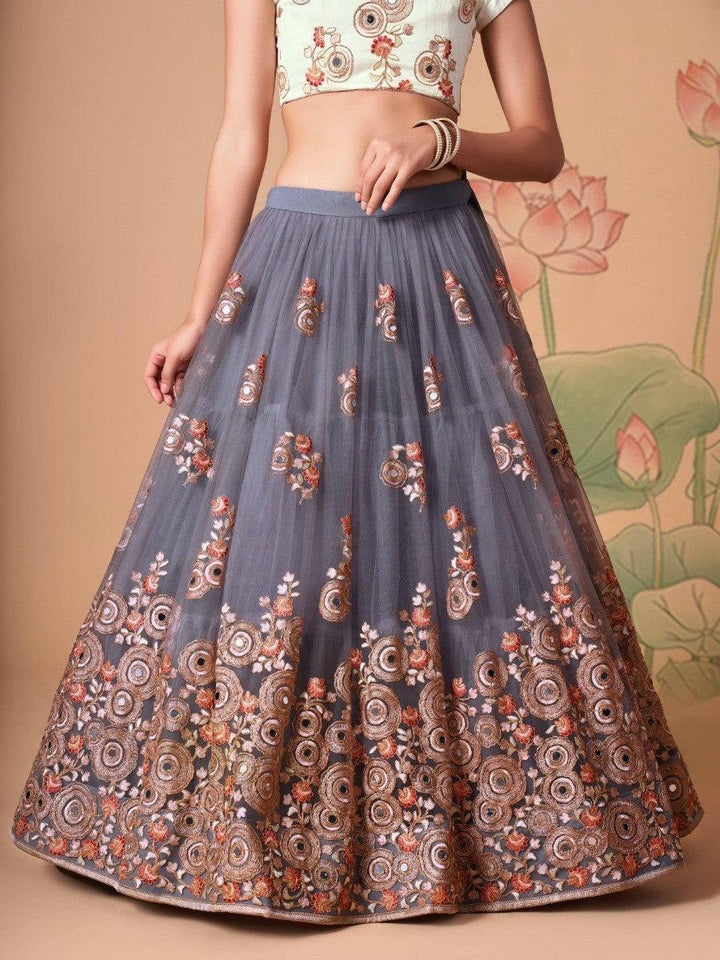 Stylish grey lehenga with matching choli and decorative details.