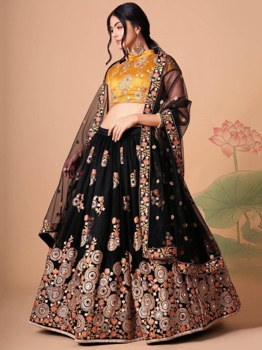 Modern black lehenga with matching yellow embroidered choli.