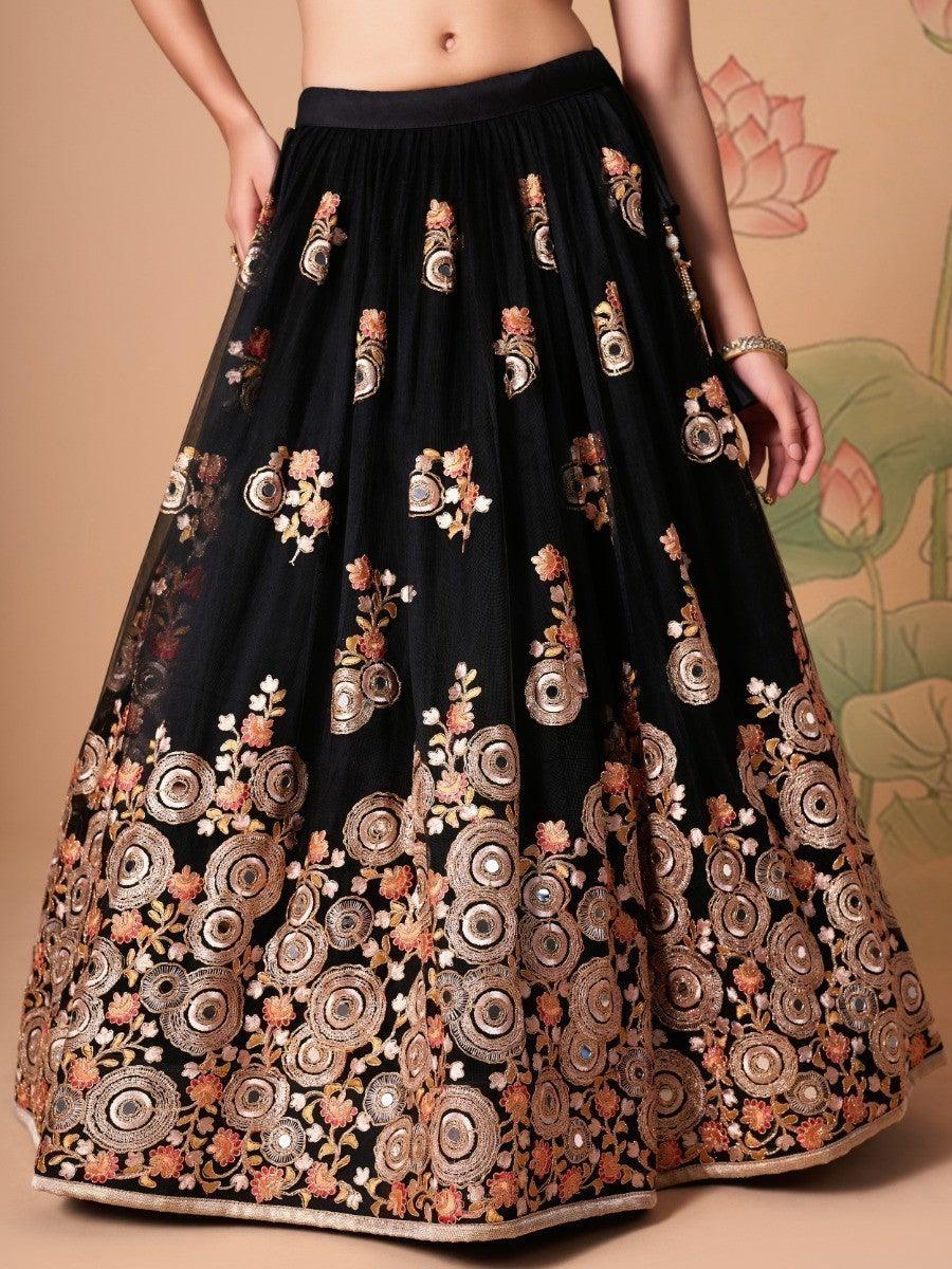 Black net lehenga with yellow choli for parties and ceremonies.