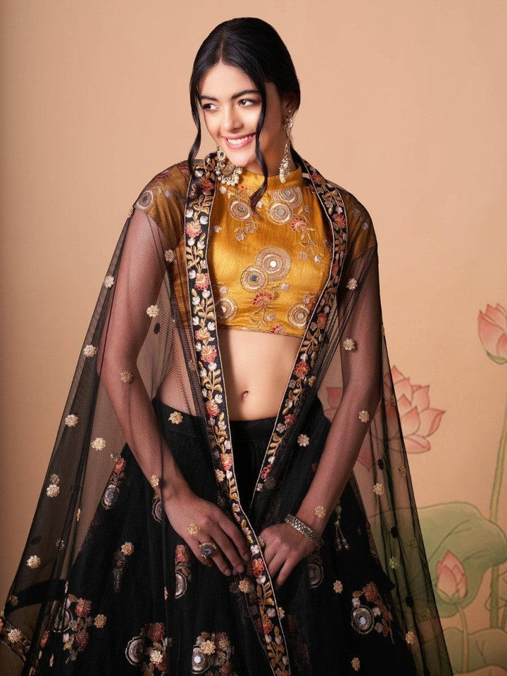 Black lehenga with net dupatta and sequin work for special events.