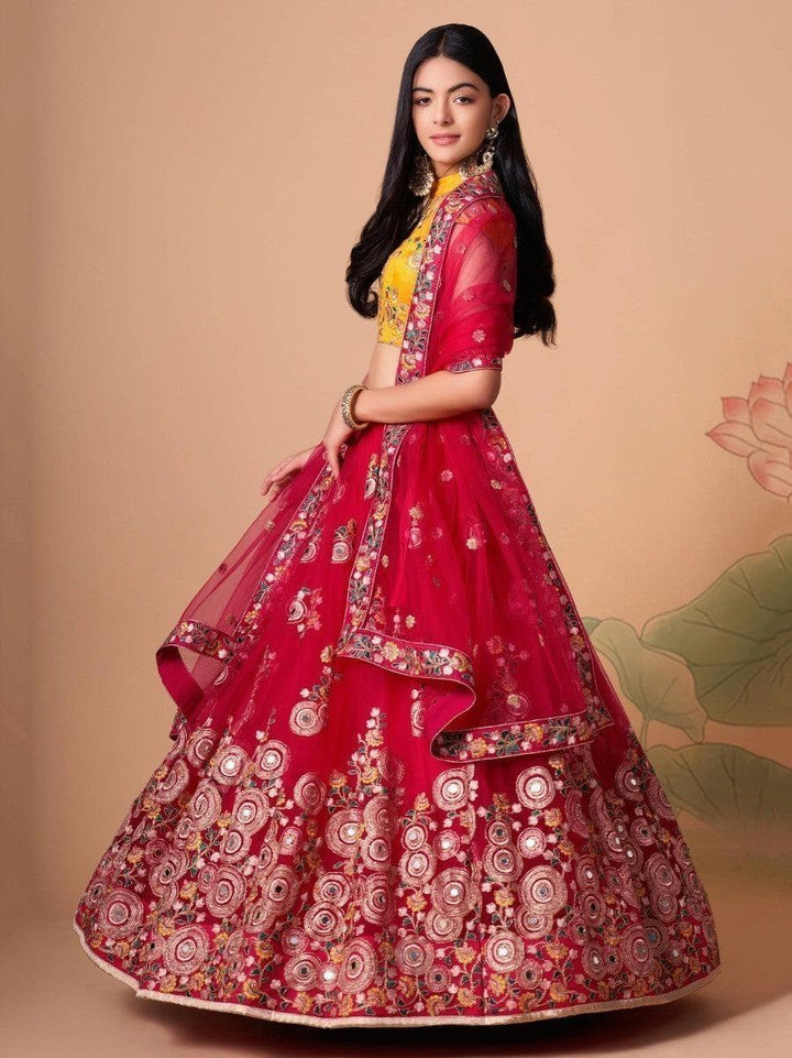 Elegant hot pink lehenga with matching yellow choli and dupatta.