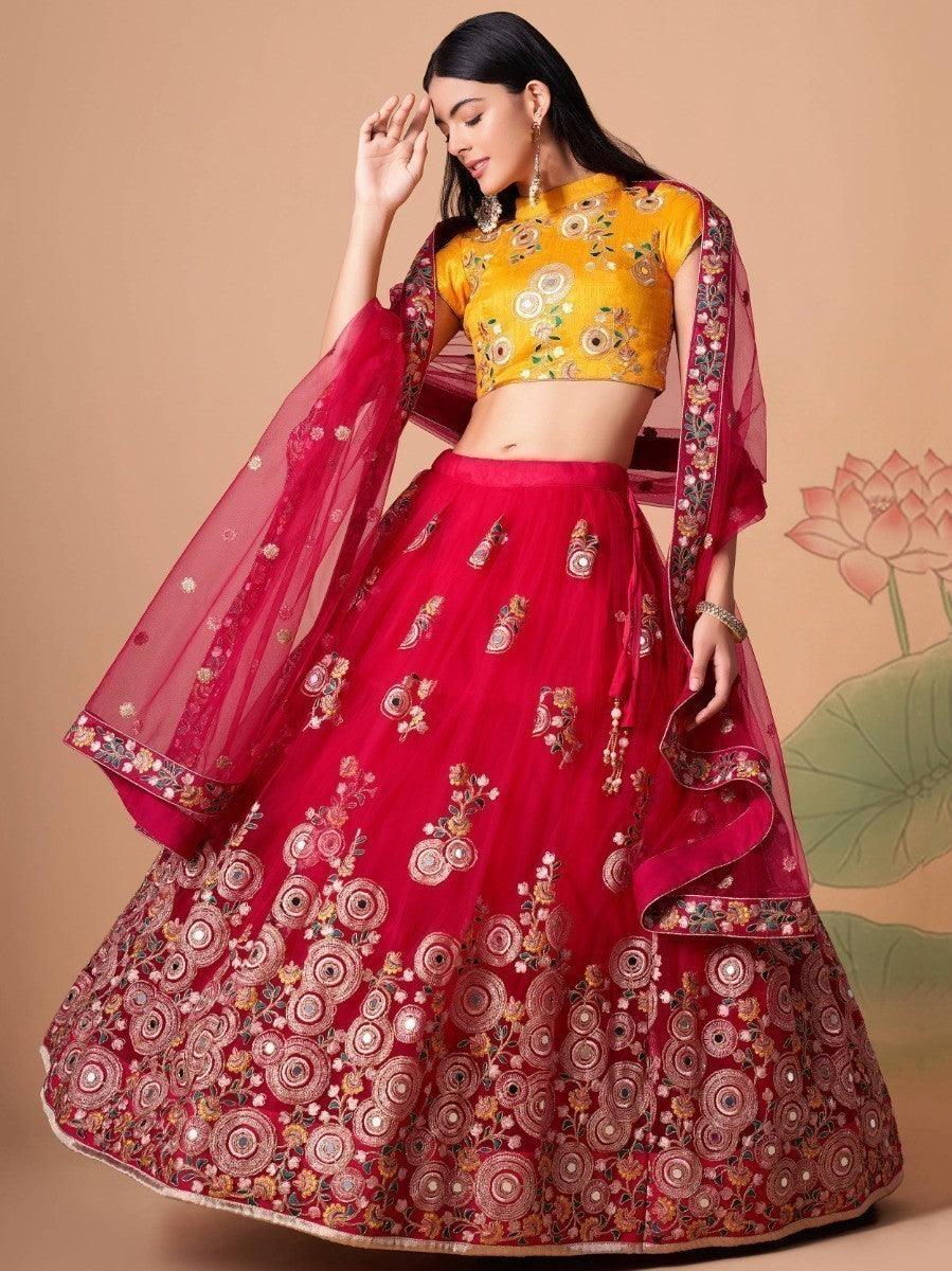 Hot pink lehenga with mirror work and sequin embroidery details.