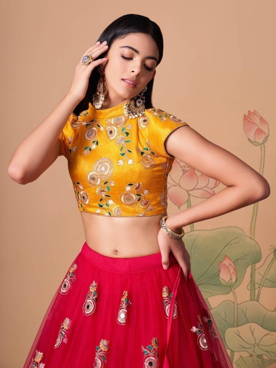 Hot pink lehenga with net material and detailed sequin work.