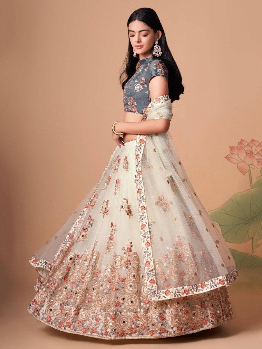 Elegant off-white lehenga with matching grey art silk choli.