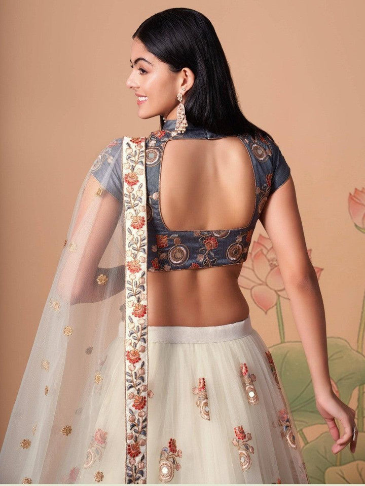 Bridal off-white lehenga with thread and sequin embroidery.