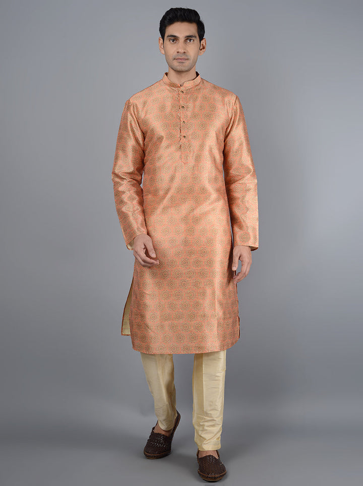 Elegant orange kurta with premium embroidery details.