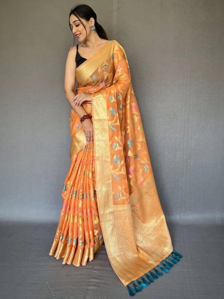 Orange silk saree crafted for elegance and style.