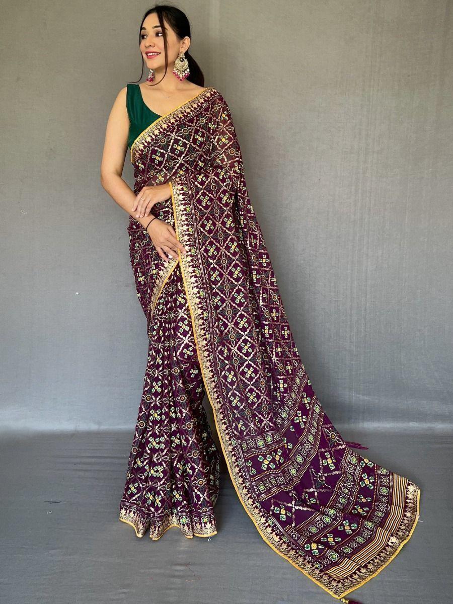 Purple georgette saree crafted for elegance and style.