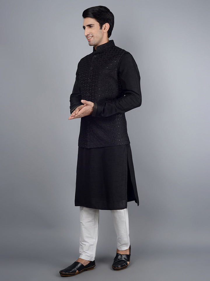 Elevate your evening attire with this sophisticated black embroidered bandhgala jacket, crafted for style and comfort.